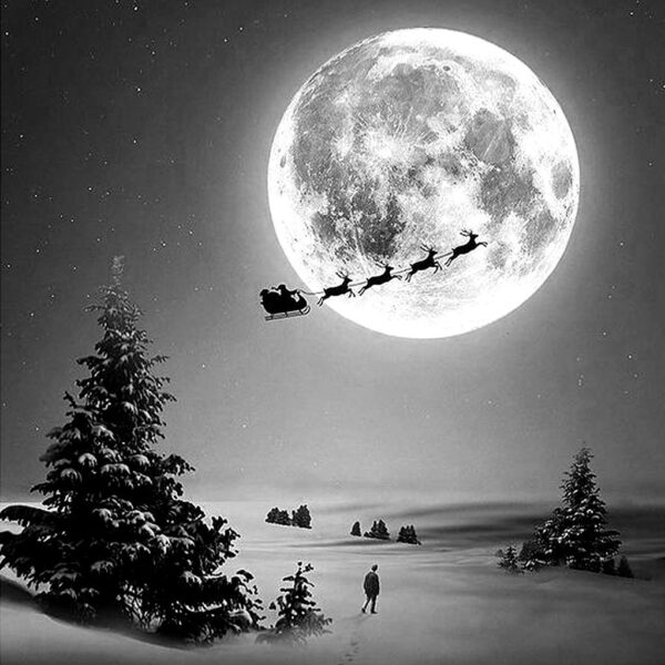 Silhouette of Santa’s sleigh flying across a full moon on a snowy Christmas night