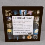 Black LED Box Frame featuring instructions for setup, battery activation, and remote use, perfect for displaying photos or artwork with customizable lighting.