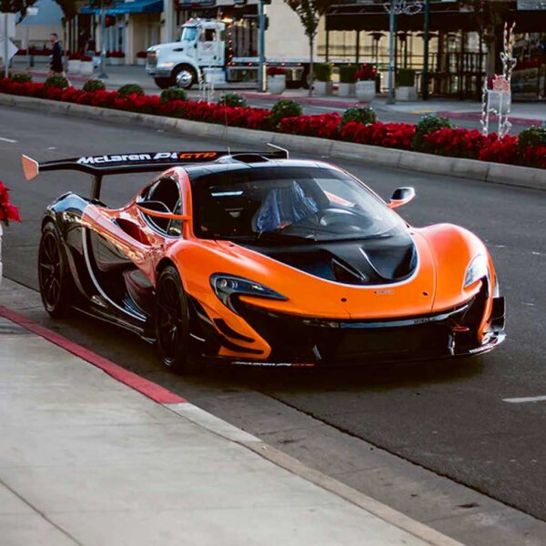 McLaren P4 GTR sports car parked on a city street, ideal for display in an LED Box Frame for automotive enthusiasts.
