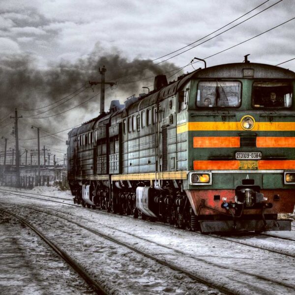Siberian locomotive passing through snowy tracks, ideal for LED Box Frame display.