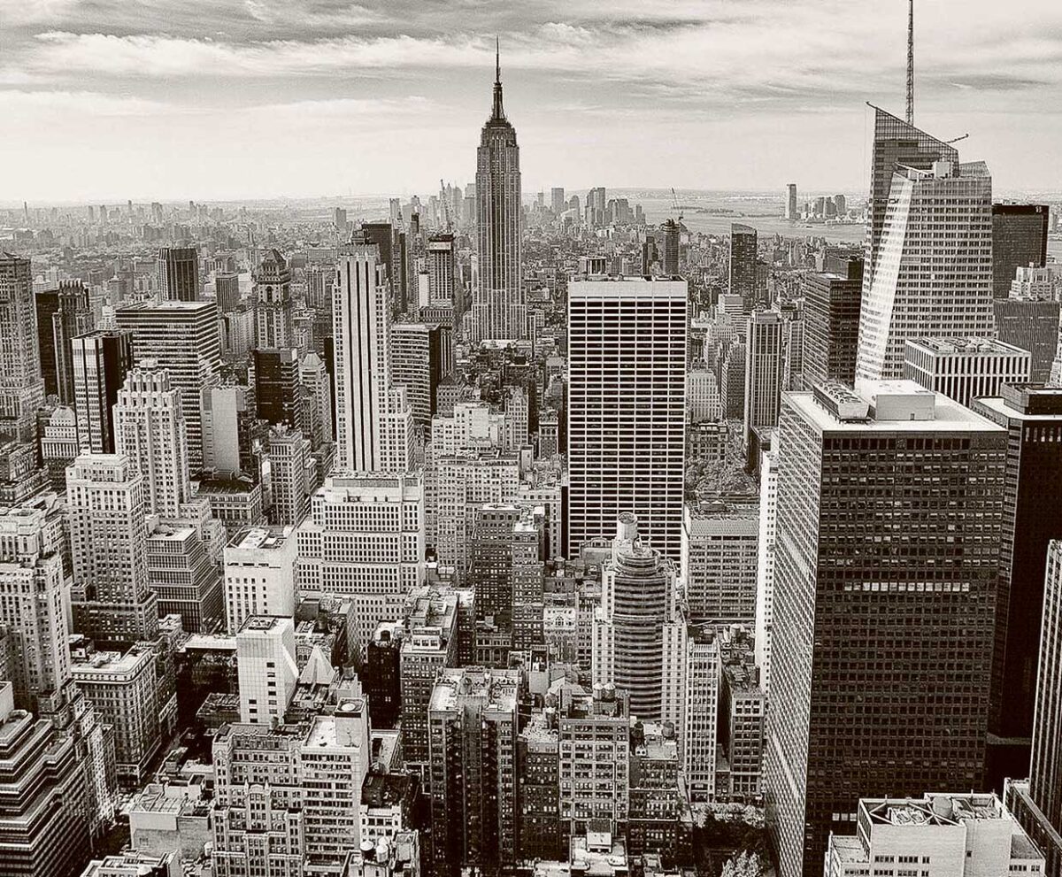 Black and white aerial view of Manhattan skyline with iconic skyscrapers captured in an LED Box Frame, perfect for urban and modern decor.