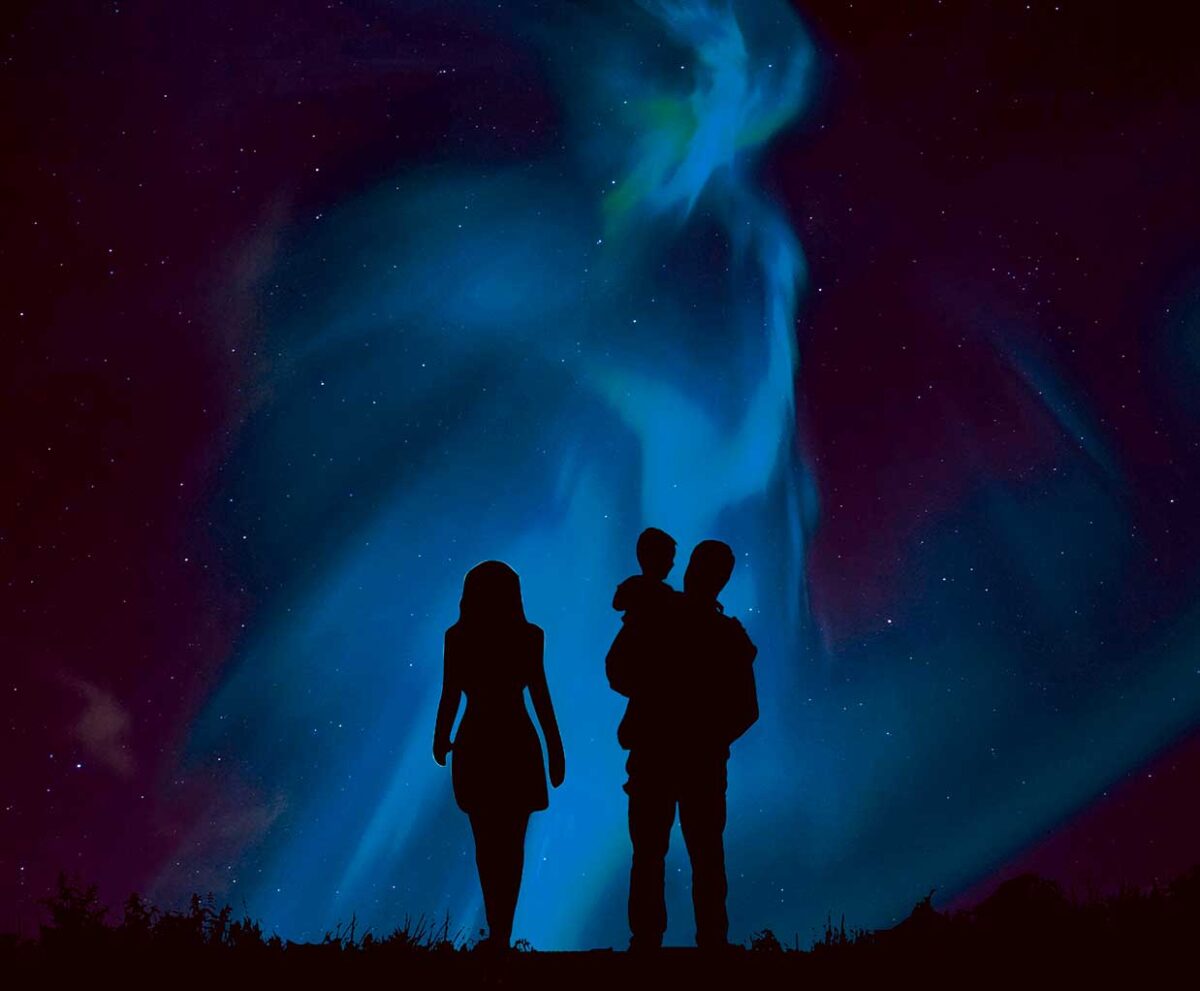 Family watching the Northern Lights, captured in an LED Box Frame, perfect for adding a celestial touch to home decor."