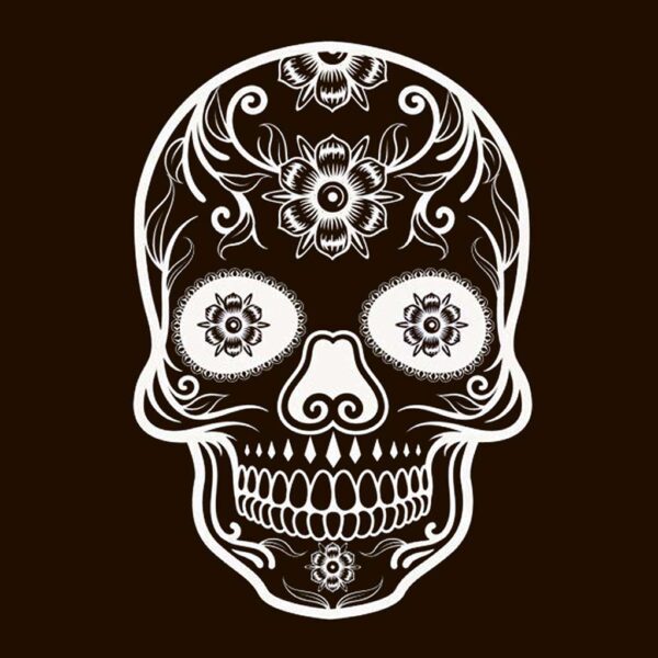Detailed white candy skull design with floral accents on a dark background.