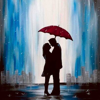 A romantic couple sharing a kiss under a red umbrella in the rain set against a cityscape ideal for display in an LED Box Frame that brings warmth and romance to your home decor