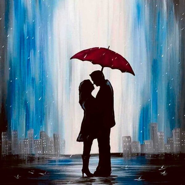A romantic couple sharing a kiss under a red umbrella in the rain, set against a cityscape, ideal for display in an LED Box Frame that brings warmth and romance to your home decor.