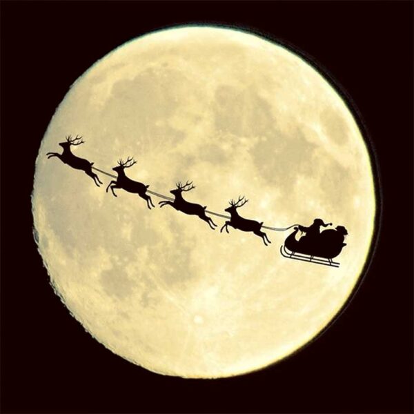 Silhouette of Santa and reindeer flying across the full moon, a festive scene perfect for display in an LED Box Frame.