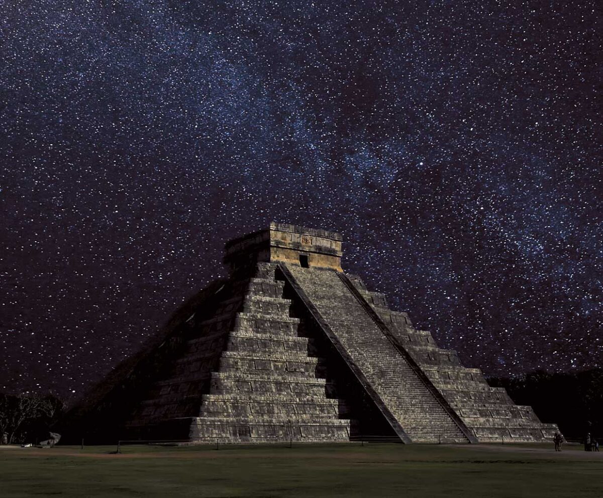 A Mayan pyramid under a breathtaking starry night sky, filled with shimmering constellations