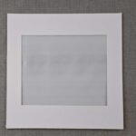 White oblong mount insert for LED Box Frame, offering a clean, energy-efficient display with customizable LED lighting options.