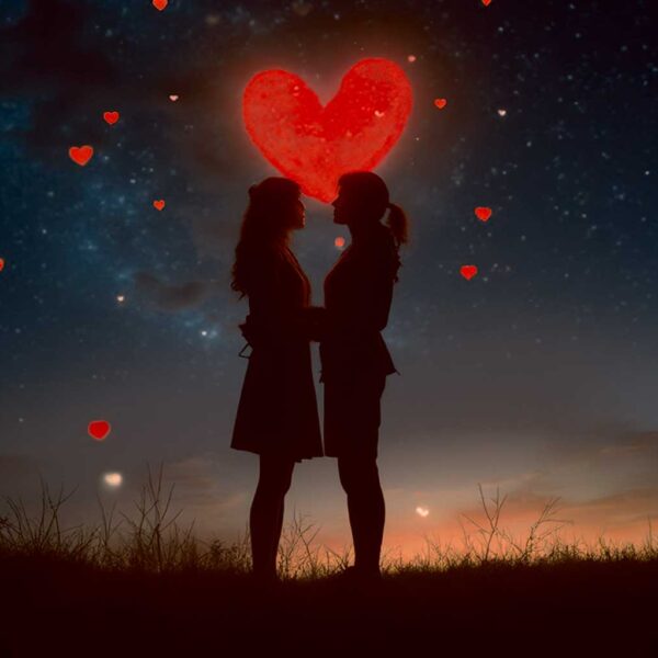 Romantic couple silhouette with heart-shaped glow under a starry sky, framed in an eco-lit LED Box Frame with customizable lighting.